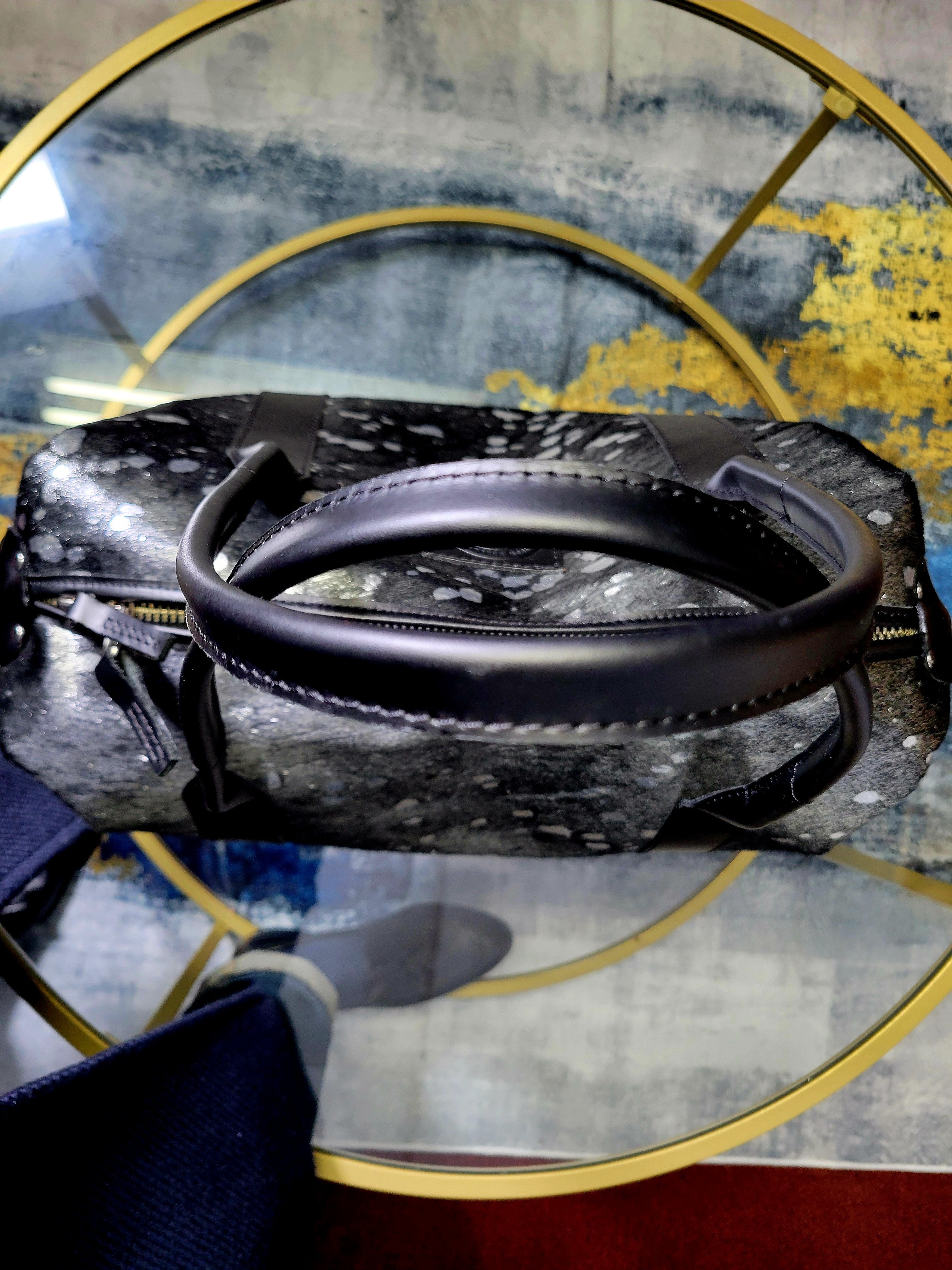 Black and silver medium duffel bag