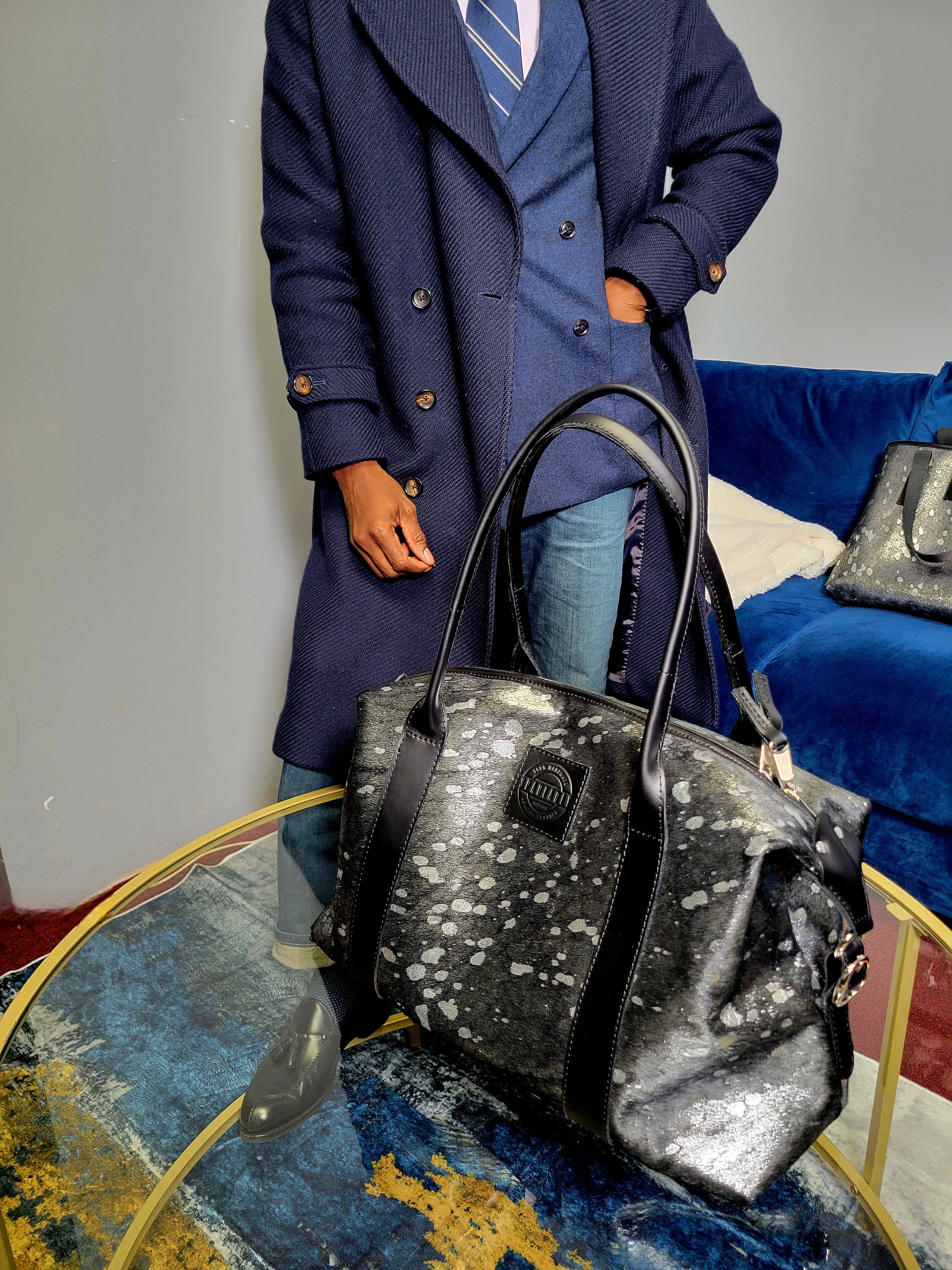 Black and silver medium duffel bag